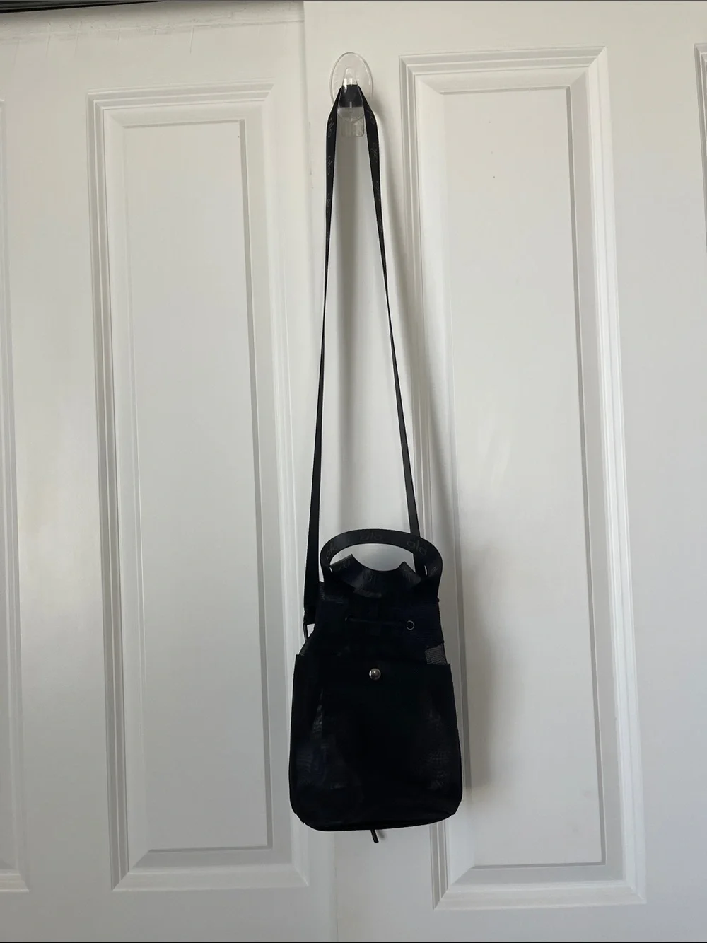 ALO Black Sheer Mesh Bucket Crossbody Bag with drawstring closure